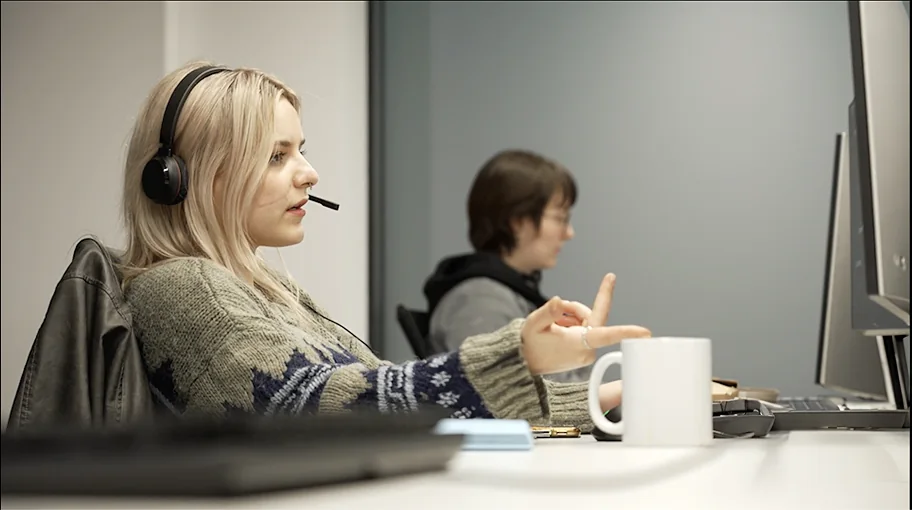 Two of the Airship team at their desks